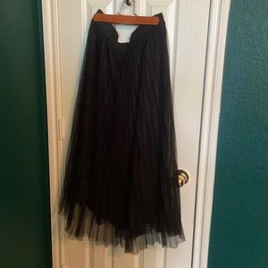 Black pleated skirt with tulle